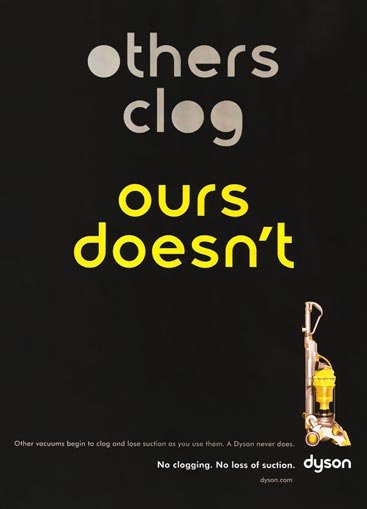 Typography-oriented advert for Dyson, reading "others clog" (with filled-in letterforms) and "ours doesn't" (with clear letterforms)