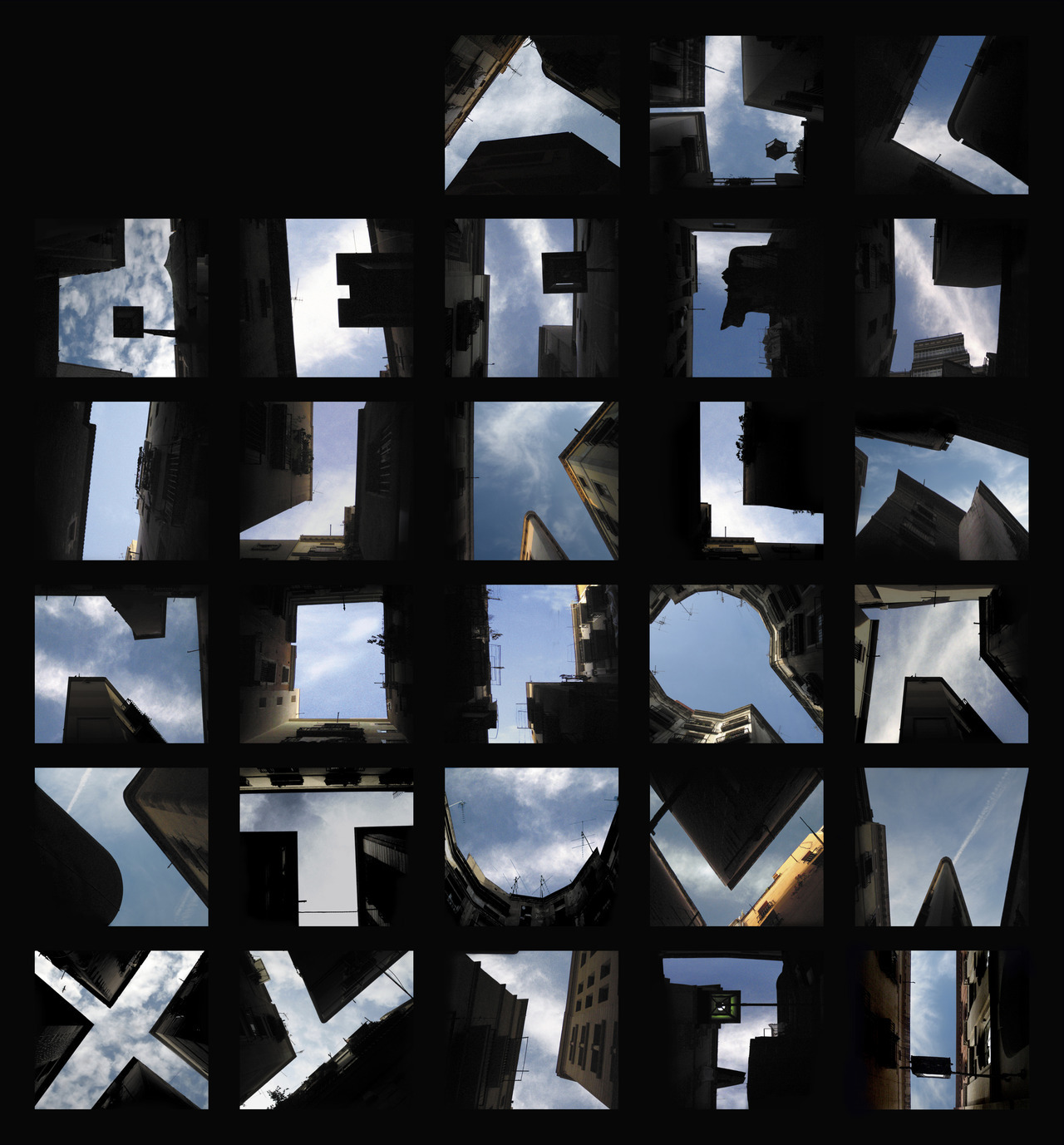 A photographic alphabet of letters, where the sky is the letter background and the shape is formed by surrounding buildings
